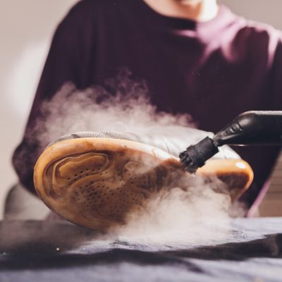 Washing,The,Dirty,Cleaning,The,Shoes,With,A,Steam,Cleaner